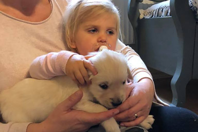 Baby with puppy
