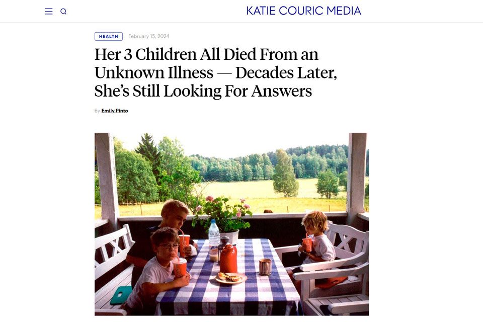 three children sit outside on a porch